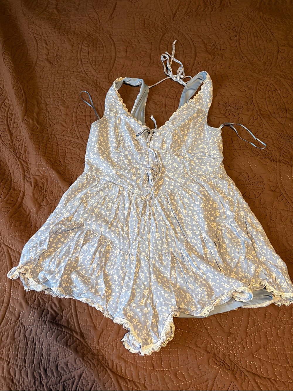 Francesca's Light Blue Floral Romper with Lace Details